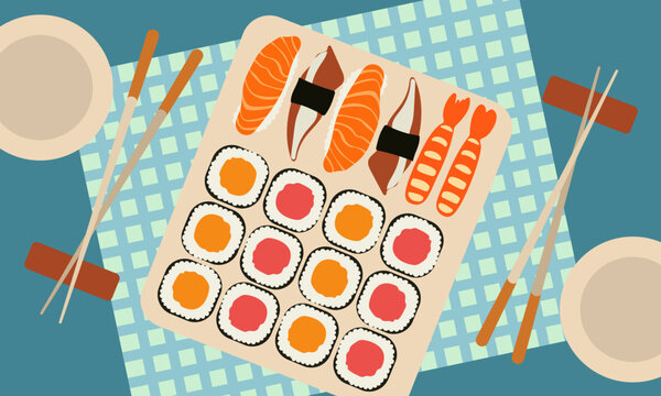Sushi and rolls in a square plate on a checkered napkin. Asian cuisine. Delicious Japanese food. Top view