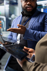 Inspectors team coordinate review in a renewable energy power plant, emphasizing collaboration in the manufacturing process and solar technology development. Industrial operations.