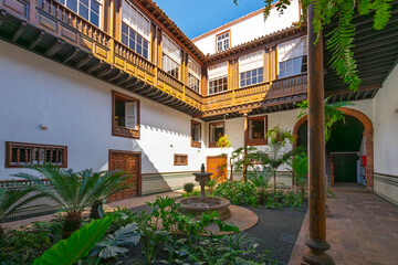 The interior courtyard patio garden of Casa Montañés, an historic estate built in 1746 in the historic old town of San Cristobal de la Laguna, Spain, Tenerife island.