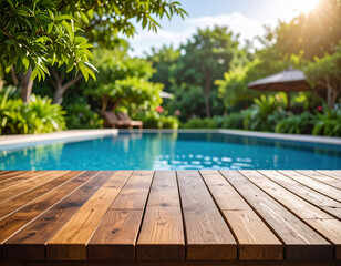 Fototapeta premium A luxurious swimming pool surrounded by lush green trees, wooden decking, and sunbeds creates a peaceful and inviting atmosphere perfect for relaxation and outdoor enjoyment. copy space