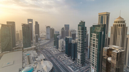 Skyscrapers before sunset timelapse in the skyline of commercial center of Doha