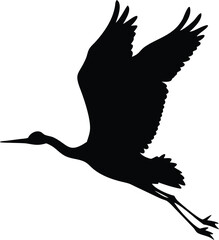 Obraz premium a black silhouette of a crane in flight isolated