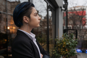 Portrait of young businesswoman in suit