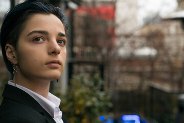 Portrait of young businesswoman in suit