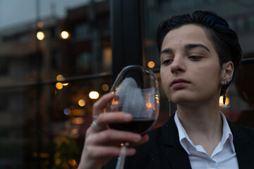Young woman holding a wine glass