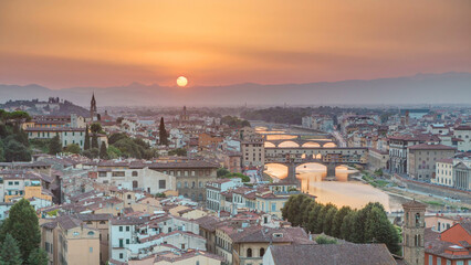 Skyline view of Arno River timelapse. Ponte Vecchio from Piazzale Michelangelo at Sunset, Florence, Italy.