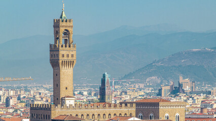 Palazzo Vecchio timelapse on piazza della Signora in the morning as seen from Piazzale Michelangelo. Florence, Italy.