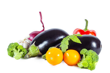 Fresh juicy ripe eggplant, bell pepper, yellow tomatoes, onion and garlic.