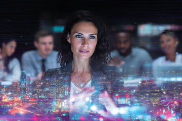 Confident businesswoman in a dark office using augmented reality or holographic interface, with glowing city overlay and tech visuals