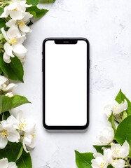 Blank Smartphone Screen Mockup with White Flowers and Greenery on a Textured White Background