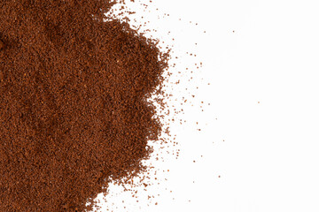 Ground coffee spread on a white background with clean negative space. Ideal for branding, food design, packaging, and coffee-related promotional materials