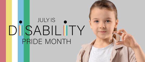 Little girl with hearing aid on light background, closeup