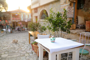 National cafe tables on the street of the Old Bar Town in Montenegro