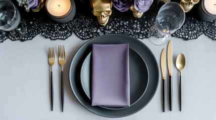 Elegant gothic halloween table setting with skulls and candlelight