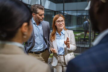 Caucasian businesspeople on the meeting with multicultural colleagues