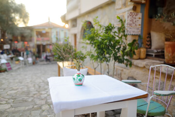 National cafe tables on the street of the Old Bar Town in Montenegro