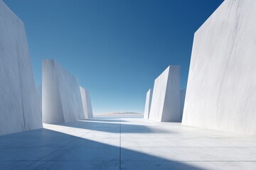 Minimalist architectural space with geometric white walls and clear blue sky, creating a sense of clean, modern serenity.