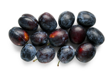 Ripe plums on white background
