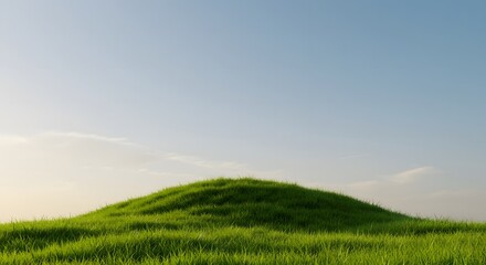 Obraz premium Serene Green Hill Under a Vast Blue Sky A Peaceful Landscape Photograph Background