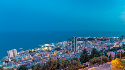 Cityscape of Monte Carlo, Monaco day to night timelapse with roofs of buildings after summer sunset.