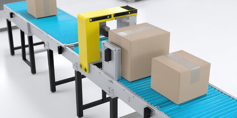Cardboard boxes move on a blue conveyor belt with a yellow scanning device overseeing the process. The equipment appears industrial, used for shipping automation