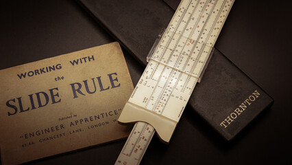 Slide Rule and instruction manual, from my university days, maths before calculators, civil...