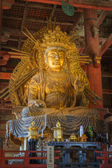 Nara, Japan - Sep 26 2024, vertical, Panoramic view of the gilded giant Buddha statue in Todaiji Temple, hall of Grand sitting Buddha Vairochana, without people, Nara, Japan