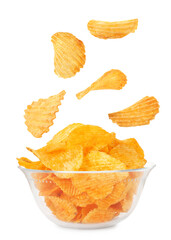 Tasty crispy potato chips falling into bowl on white background