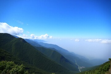 Naklejka premium view of the mountains from the top of a mountain
