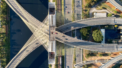 Top view of cable-stayed bridge, Marginal Pinheiros, and Pinheiros river in Sao Paulo city. 