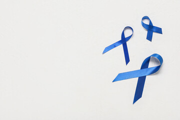 Blue ribbons on white grunge background. Prostate cancer awareness concept