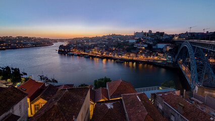 Panorama of old city Porto at river Duoro after sunset day to night timelapse, Oporto, Portugal