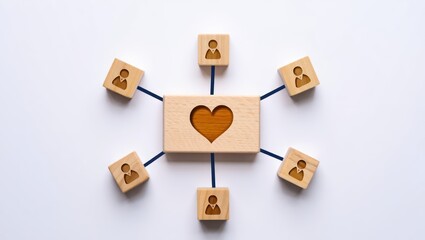 Wooden blocks connected by lines with a central block featuring a heart cutout symbolizing connection and relationships among people