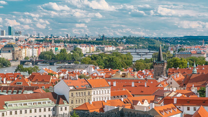 Panorama of Prague Old Town with red roofs timelapse, famous bridges and Vltava river, Czech...