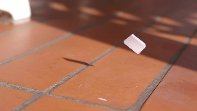 Close-up Sim card drops on a floor. lost sim card concept 