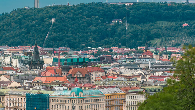 View from the top of the Vitkov Memorial timelapse on the Prague landscape and Vitkov memorials park on a sunny day