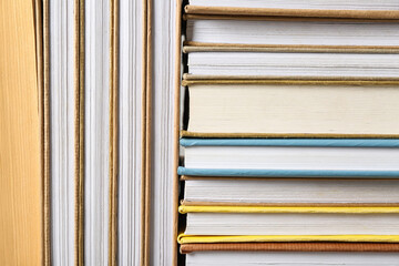 Texture of many books as background, closeup
