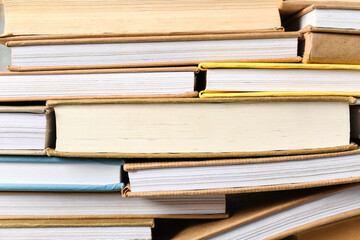 Texture of many books as background, closeup