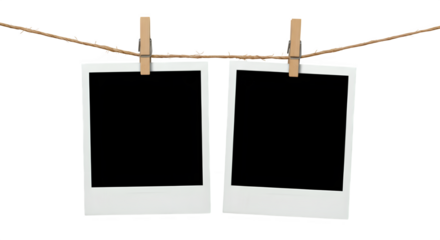 Two blank Polaroid photo frames clipped to a rope with wooden pegs, isolated on white or transparent background. PNG, perfect for nostalgia-themed designs, scrapbooks, or memory placeholders.