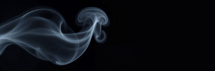 Artistic Smoke Effect with mysterious and ethereal mood showcasing delicate wisps of smoke on dark background