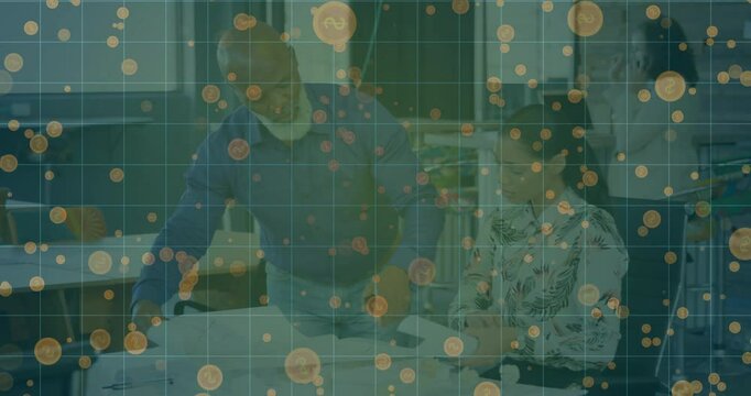 Architect picking up pen causing motion lines tracing plan and drafter highlighting area for review