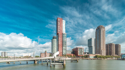 Fototapeta premium Hyperlapse of the Rijnhaven Bridge with skyscrapers in Rotterdam, Netherlands.