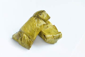Rice wrapped in banana leaves, traditional Thai rice soup