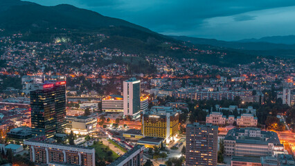 Aerial view of the southern part of Sarajevo city day to night timelapse.