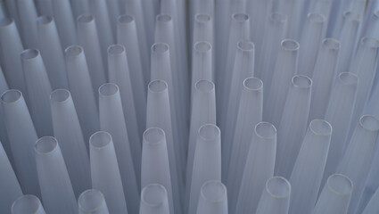 Obraz premium Abstract arrangement of numerous light gray conical tubes