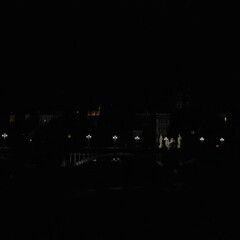 Nightscape cityscape view of florence italy with river arno and ponte santa trinita bridge scene at night