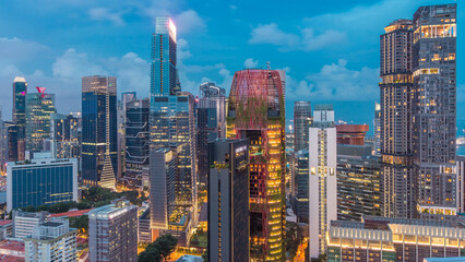 Aerial view of Chinatown and Downtown of Singapore day to night timelapse