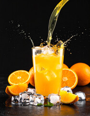 Orange lemonade isolated on dark background 