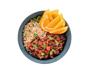 brazilian style black bean stew with rice and  orange slices