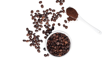 Close-up of roasted brown coffee beans piled together, showcasing rich texture, aroma, and freshness on a white studio background.
